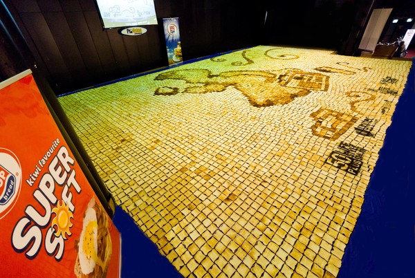 A toast mosaic is a large image made up of toast 